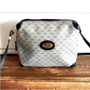 Gucci Blue Crossbody Bag with Distinctive Pattern and Gold Emblem